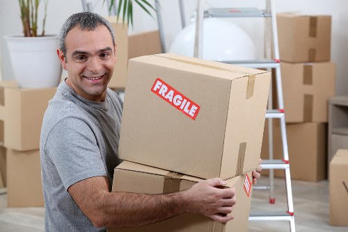 Local house removals team working in Maidahill residential street