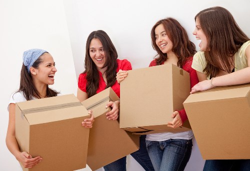 Professionals loading furniture for a residential move