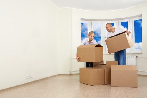 Local movers loading business items for a Maidahill relocation