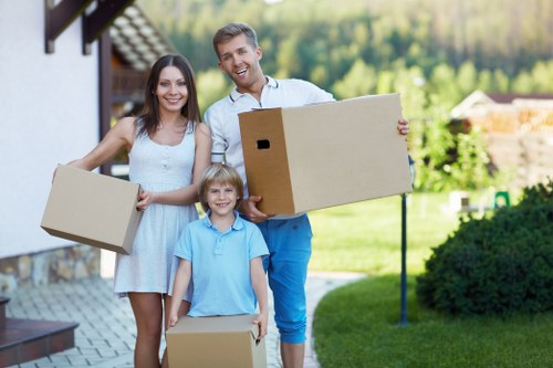 Packing and loading household items into a moving van