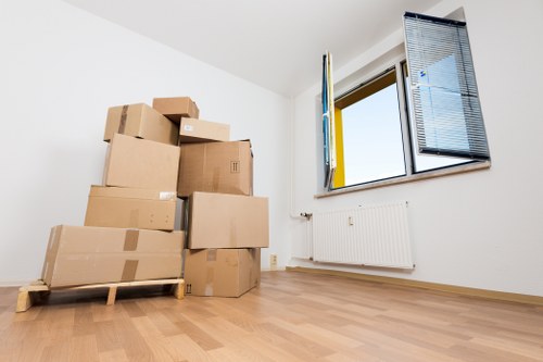 Careful unloading and placement of boxes at a new home