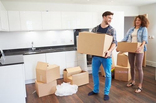 Team removing bulky furniture from a Maidahill property
