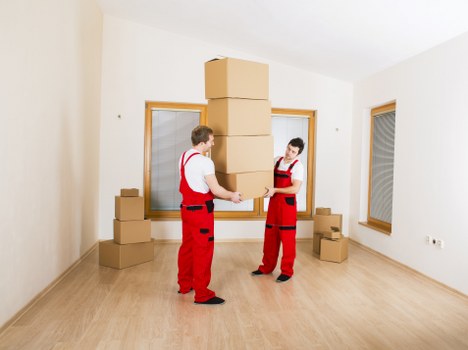 Mover loading boxes and furniture for a Maidahill house or flat removal