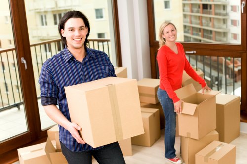 Office furniture and equipment being prepared for a Maidahill commercial move